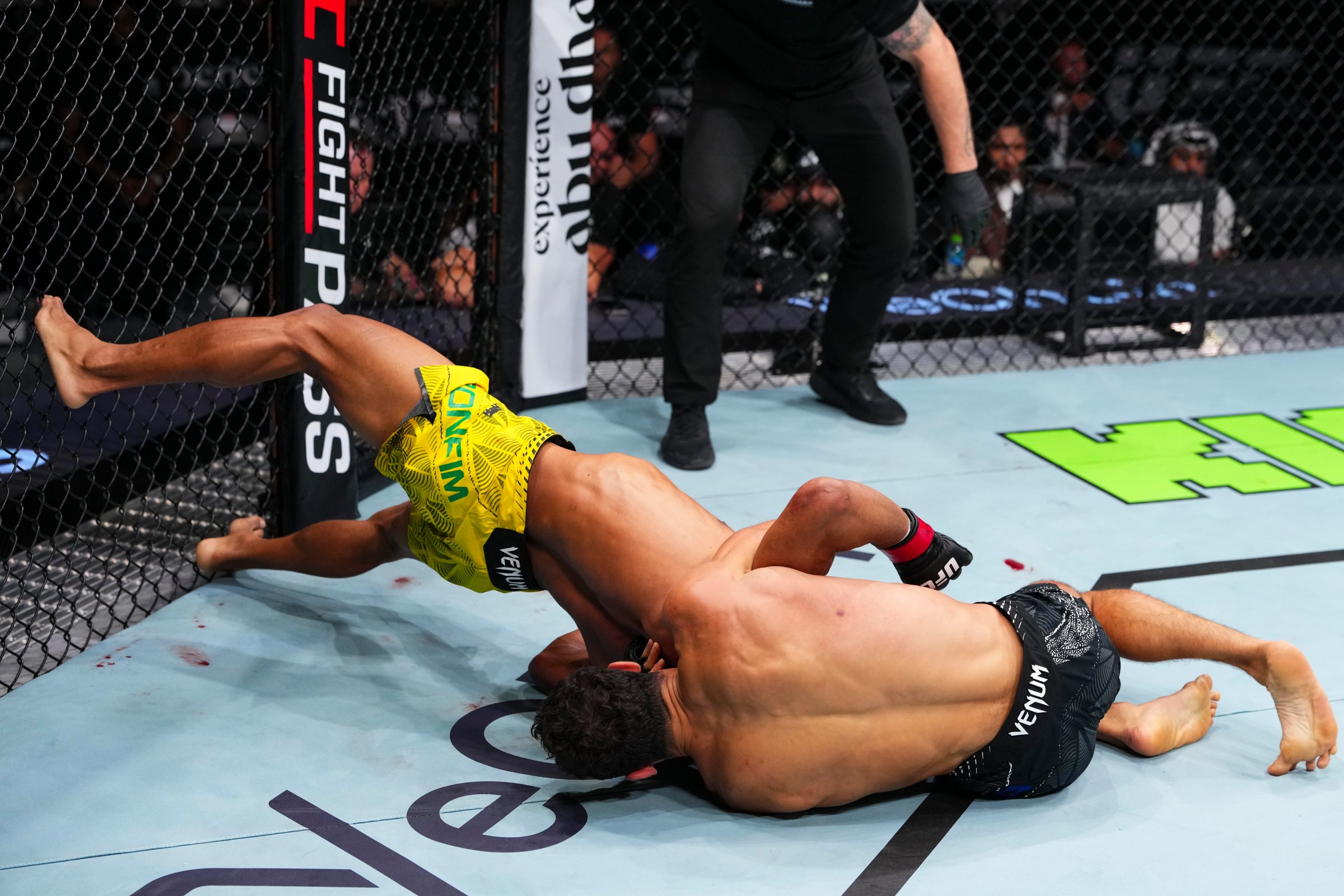 ABU DHABI, UNITED ARAB EMIRATES - JULY 24: Axel Sola grapples with Ismael Bonfim in their lightweight fight during the UFC Fight Night event at Etihad Arena July 24, 2026 in Yas Island, Abu Dhabi, United Arab Emirates. (Photo by Josh Hedges/Zuffa LLC via Getty Images)