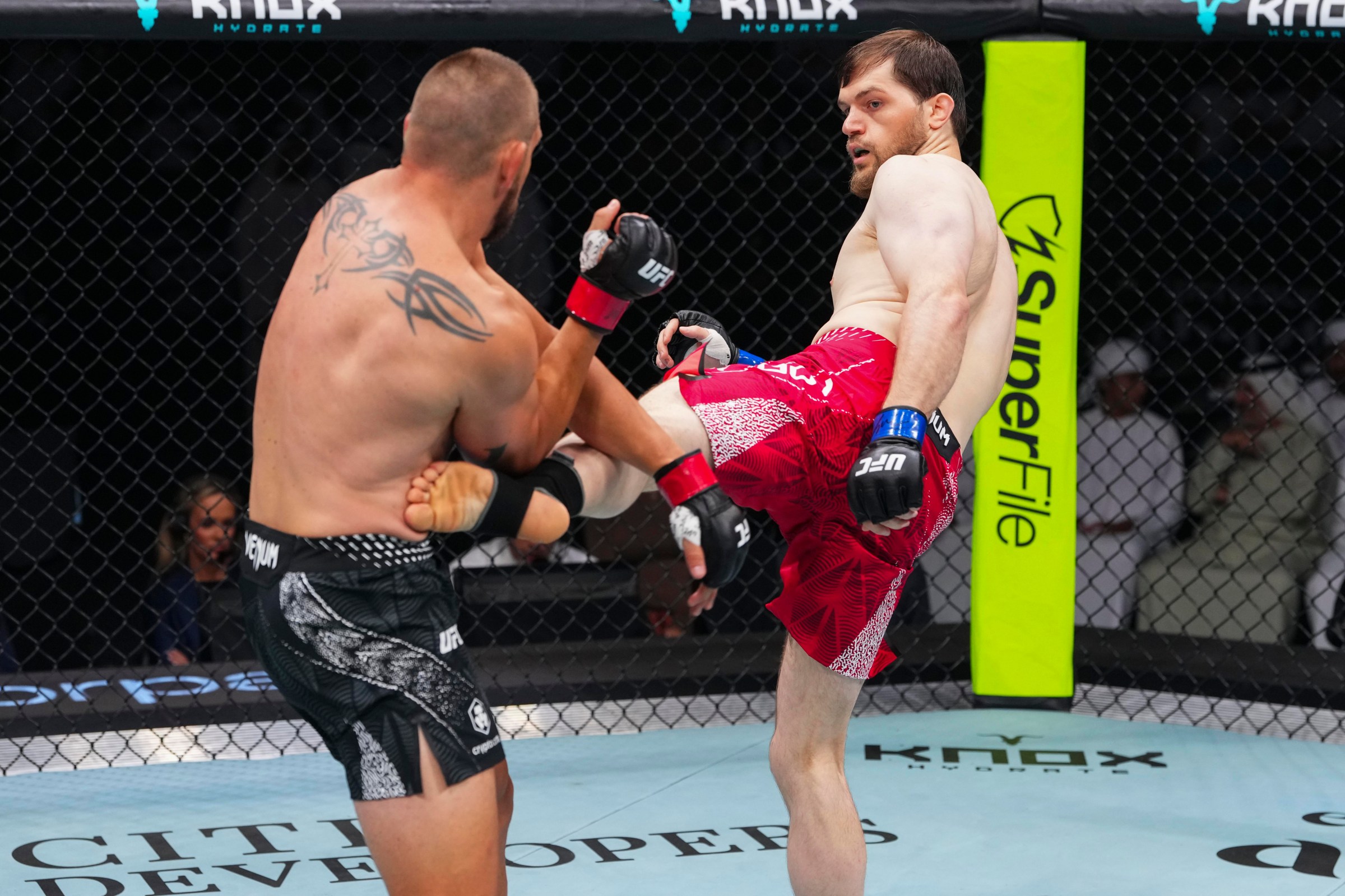 ABU DHABI, UNITED ARAB EMIRATES - JULY 24: Muhammad Saidov throws a kick against Dustin Jacoby in their light heavyweight fight during the UFC Fight Night event at Etihad Arena July 24, 2026 in Yas Island, Abu Dhabi, United Arab Emirates. (Photo by Josh Hedges/Zuffa LLC via Getty Images)