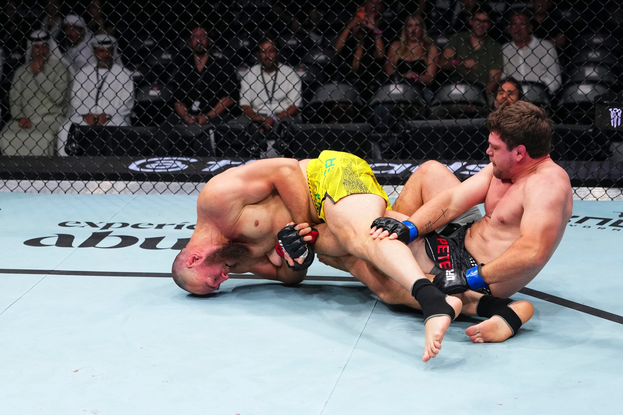 ABU DHABI, UNITED ARAB EMIRATES - JULY 24: Valter Walker grapples with Thomas Petersen in their heavyweight fight during the UFC Fight Night event at Etihad Arena July 24, 2026 in Yas Island, Abu Dhabi, United Arab Emirates. (Photo by Josh Hedges/Zuffa LLC via Getty Images)