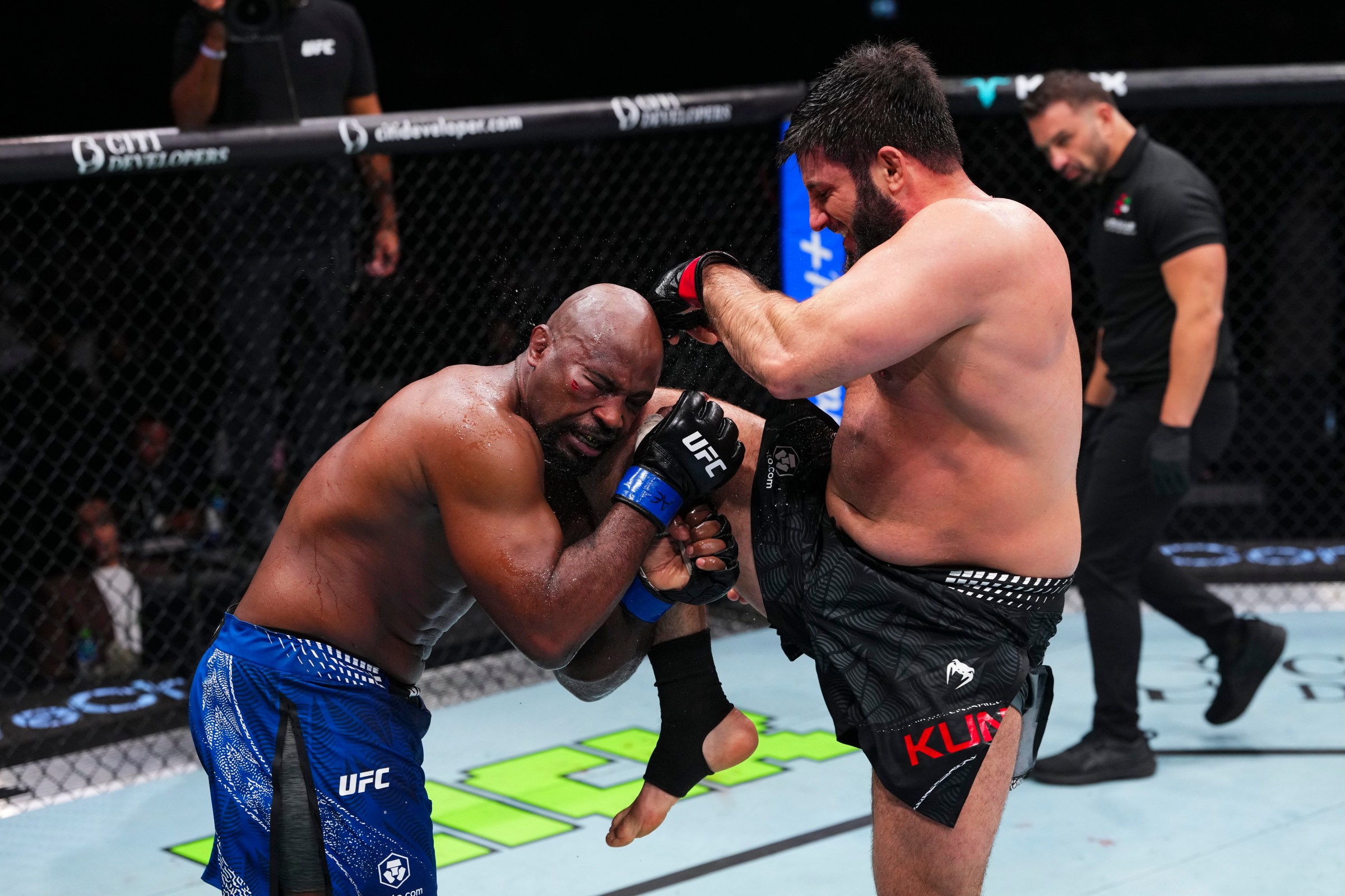 ABU DHABI, UNITED ARAB EMIRATES - JULY 24: Rizvan Kuniev throws a knee against Tyrell Fortune in their heavyweight fight during the UFC Fight Night event at Etihad Arena July 24, 2026 in Yas Island, Abu Dhabi, United Arab Emirates. (Photo by Josh Hedges/Zuffa LLC via Getty Images)