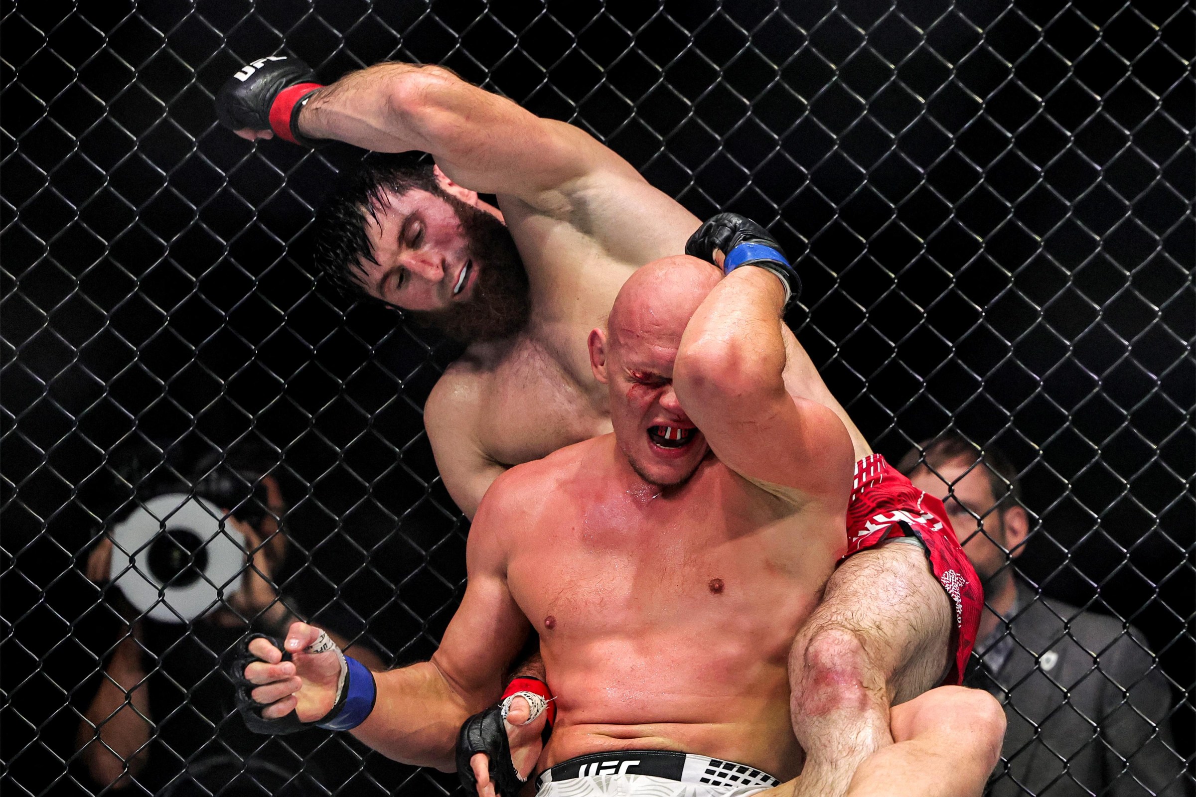 Russia’s Magomed Ankalaev and Uzbekistan’s Bogdan Guskov compete in their men’s light heavyweight fight in the UFC Fight Night event at Etihad Arena in Abu Dhabi on July 25, 2026. (Photo by Fadel SENNA / AFP via Getty Images)