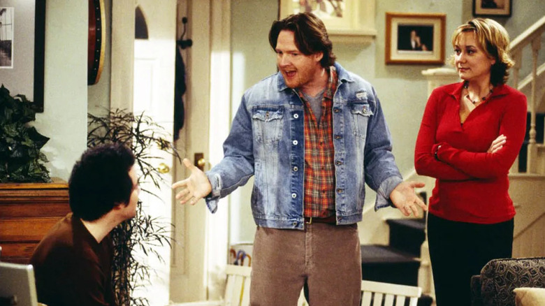 Sean Finnerty (Donal Logue) speaks to Eddie Finerty (Kevin Corrigan) as Claudia Finnerty (Megyn Price) watches in Grounded for Life