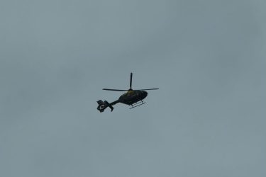 Police helicopter over Penwortham on 27 July