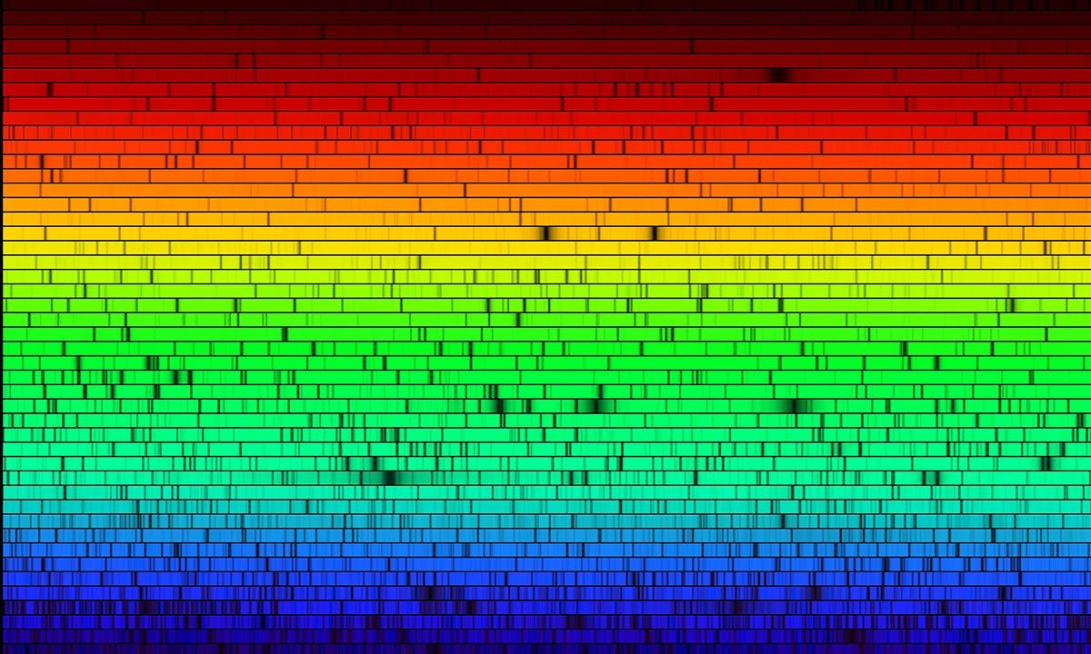 The Sun's spectrum, crossed by dark Fraunhofer lines where atoms in its outer layers absorb light at specific wavelengths, the fingerprint astronomers use to work out what a star is made of (Credit : NASA)