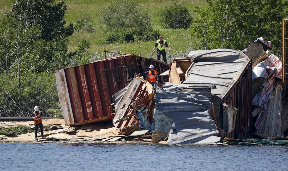 Train cars derail into water in Calgary, no indication of leaks