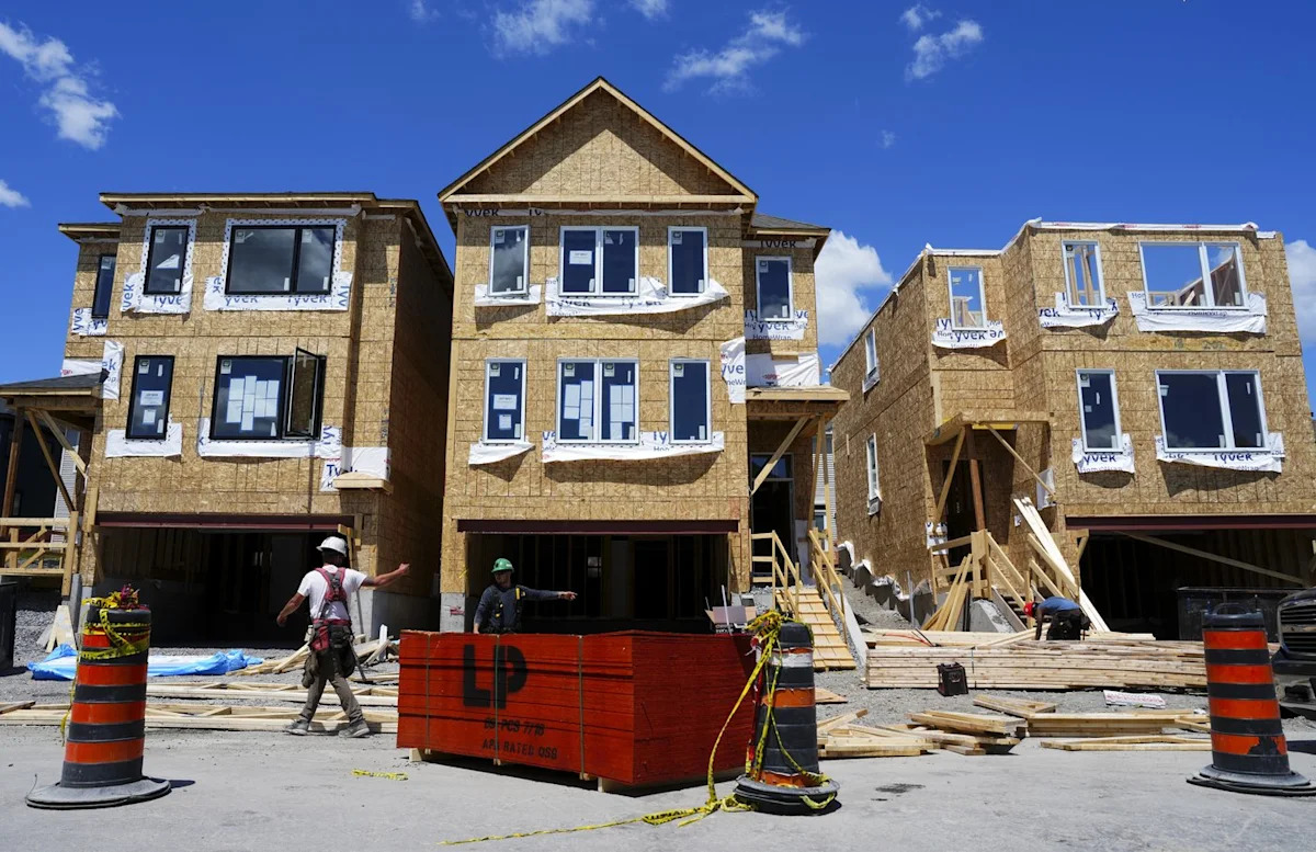 CMHC reports annual rate of housing starts in June down six per cent from May