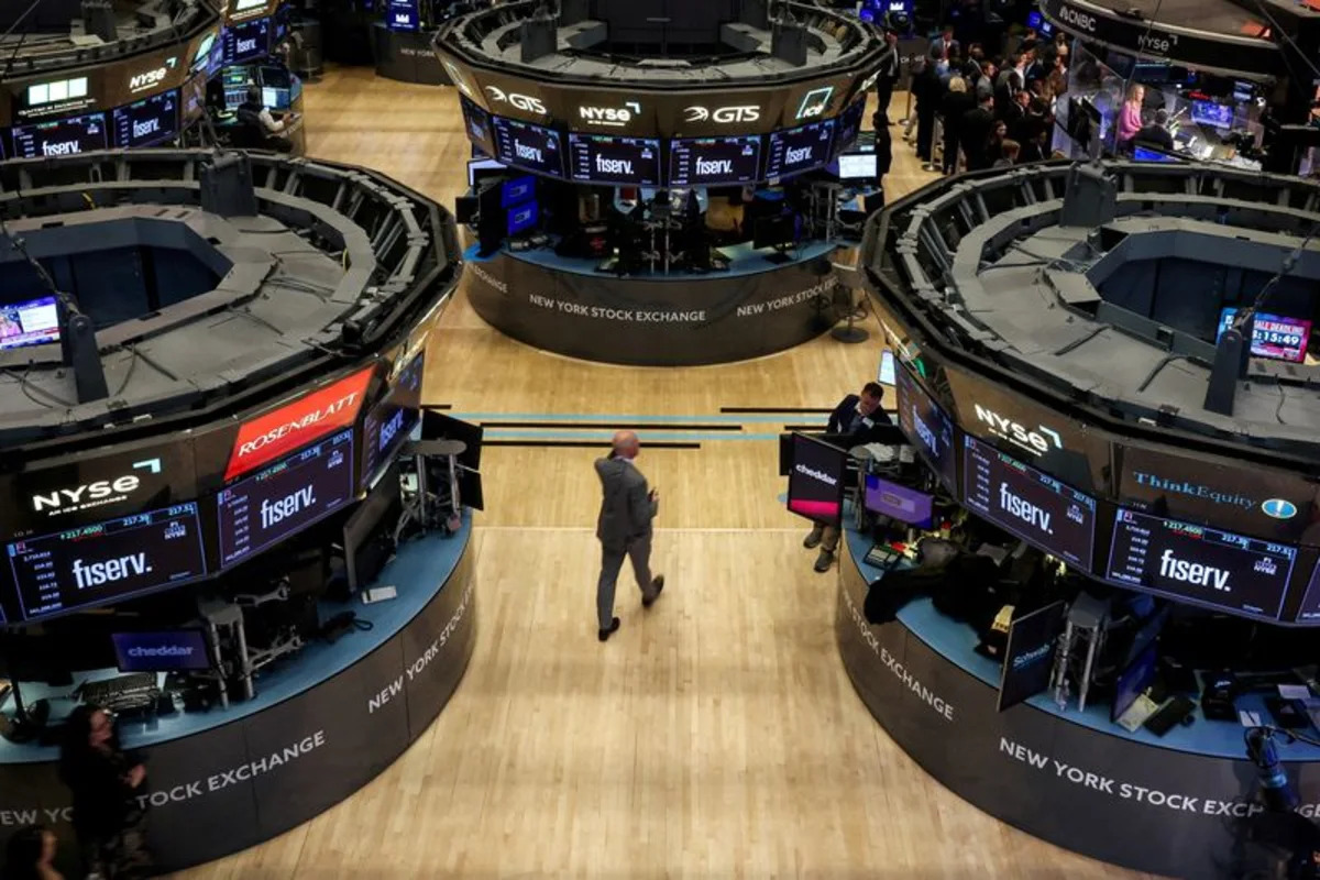 Wall St ends higher on cool inflation data, strong earnings