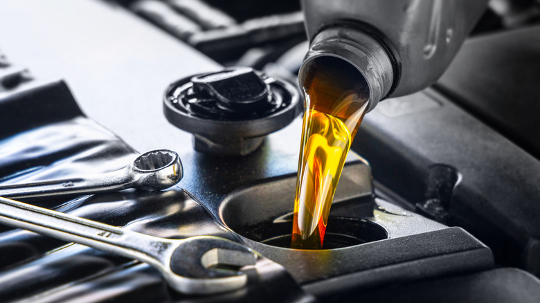 Car getting its oil changed close-up