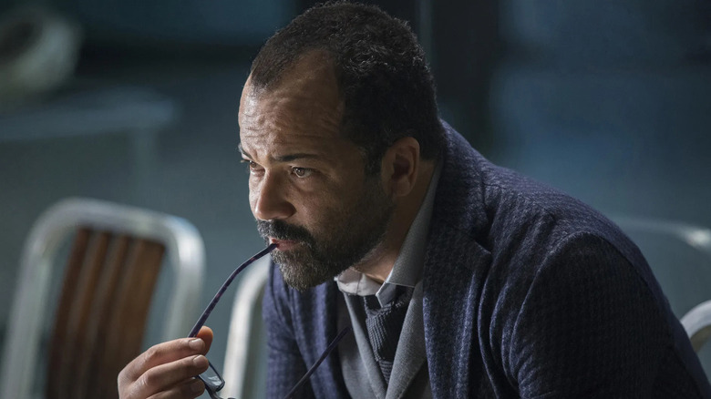 Jeffrey Wright as Bernard Lowe, chewing his glasses in Westworld.