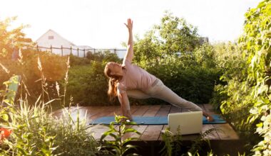 Woman doing yoga workout on mat in garden
