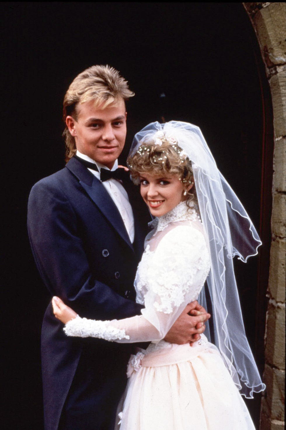 Jason Donovan as Scott, Kylie Minogue as Charlene, Neighbours 1988 jason donovan as scott, kylie minogue as charlene on their wedding day in neighbours 1988