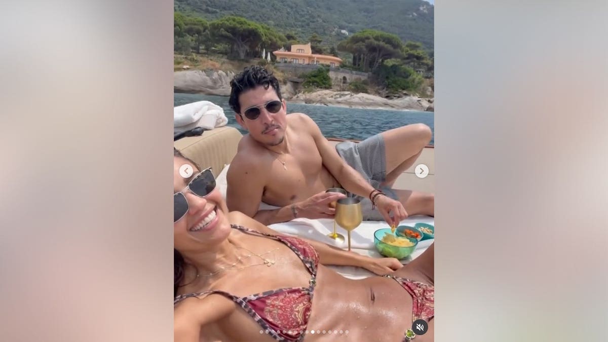 Jessica Alba and Danny Ramirez on a boat off the coast of Tuscany, Italy in July 2026.