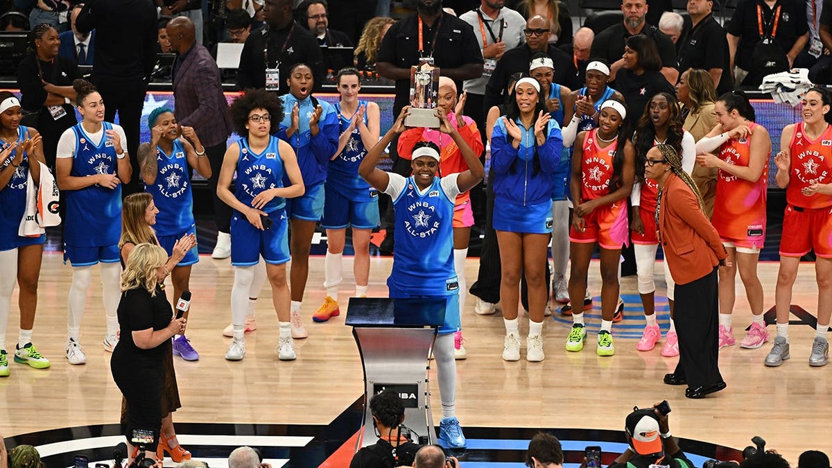 Jonquel Jones celebrates after winning the 2026 WNBA All-Star MVP award.