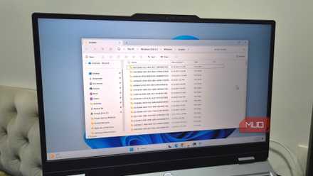 Laptop showing Windows installer folder open on desktop