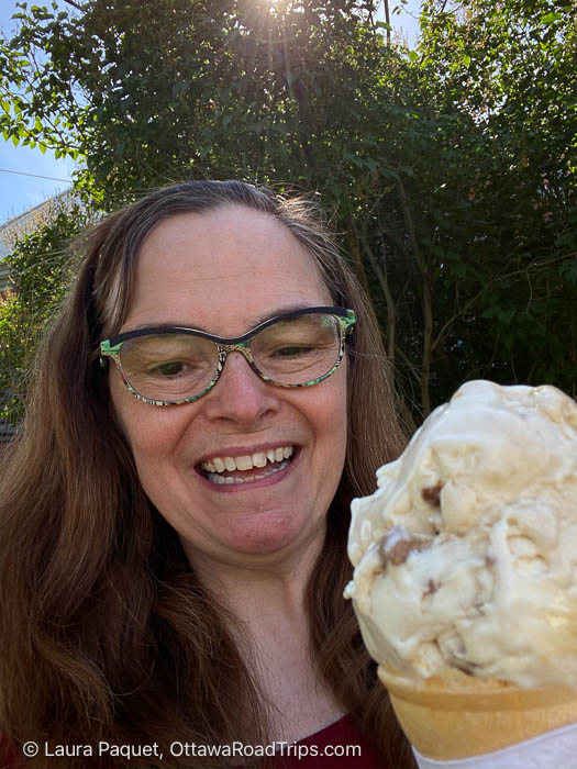 laughing woman with an ice cream cone