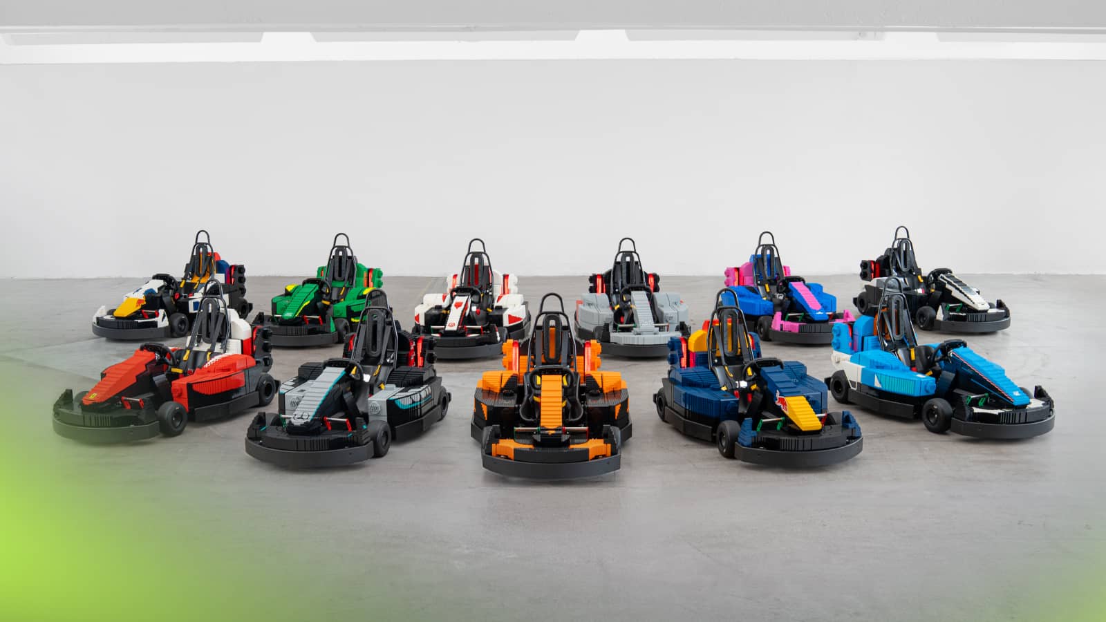 A studio-based shot of the LEGO F1 'minicars' in the colours of each team on the 2026 grid