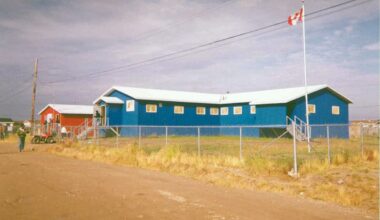 One red building and one blue building in the remote Attawapiskat First Nation