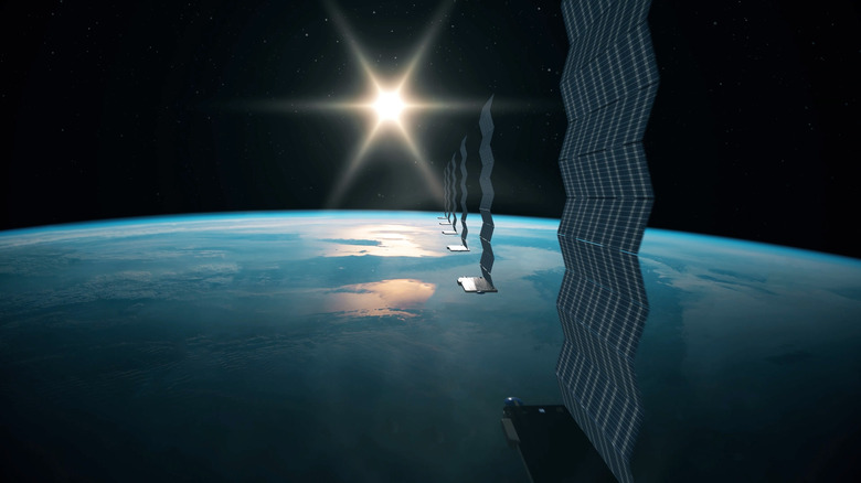 A line of Starlink satellites seen in orbit around Earth