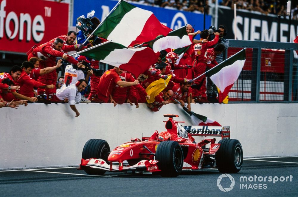 Schumacher celebrates his seventh F1 world title - five of them coming in the 2000s