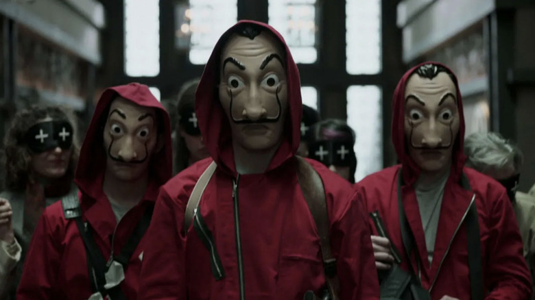 Cast of Netflix's Money Heist wearing masks
