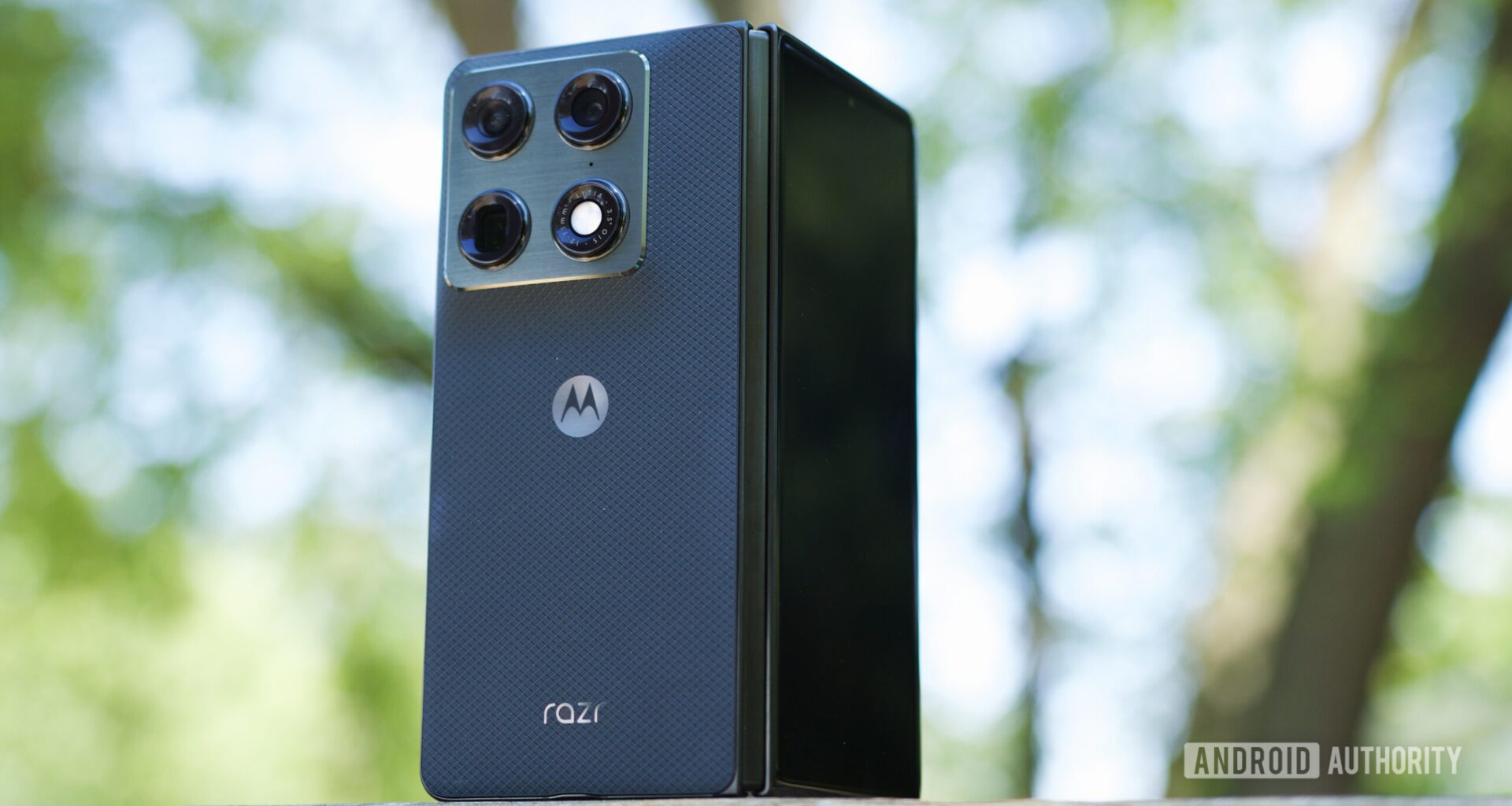 The Motorola Razr Fold standing upright outside.