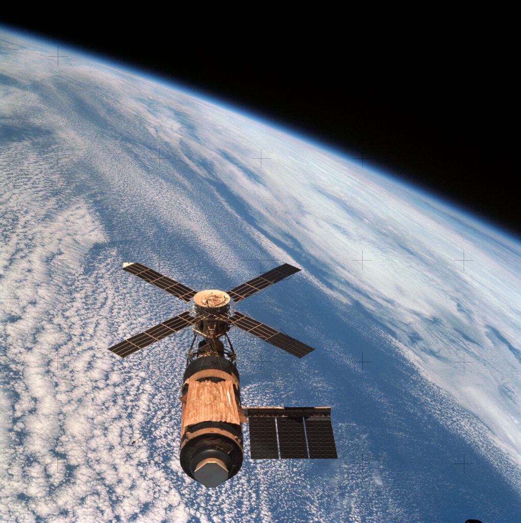 Skylab cost roughly $2.2 billion, hosted nine astronauts across three missions and remained in orbit for just over six years — before breaking apart over Western Australia, where its remains became museum exhibits, Lucite-encased souvenirs and, according to local accounts, even a cattle trough.