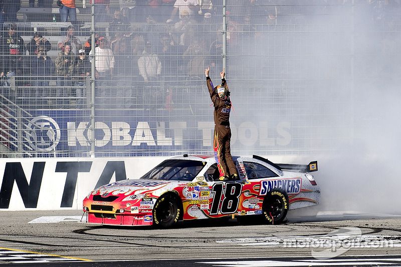 Race winner Kyle Busch celebrates