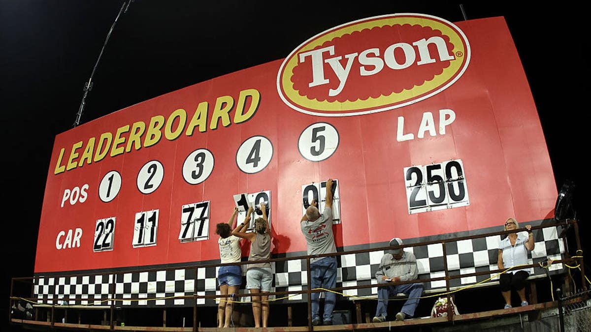Fans update the leaderboard at North Wilkesboro Speedway.