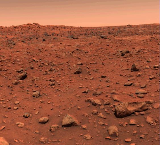 An image showing the reddish/brown surface of Mars