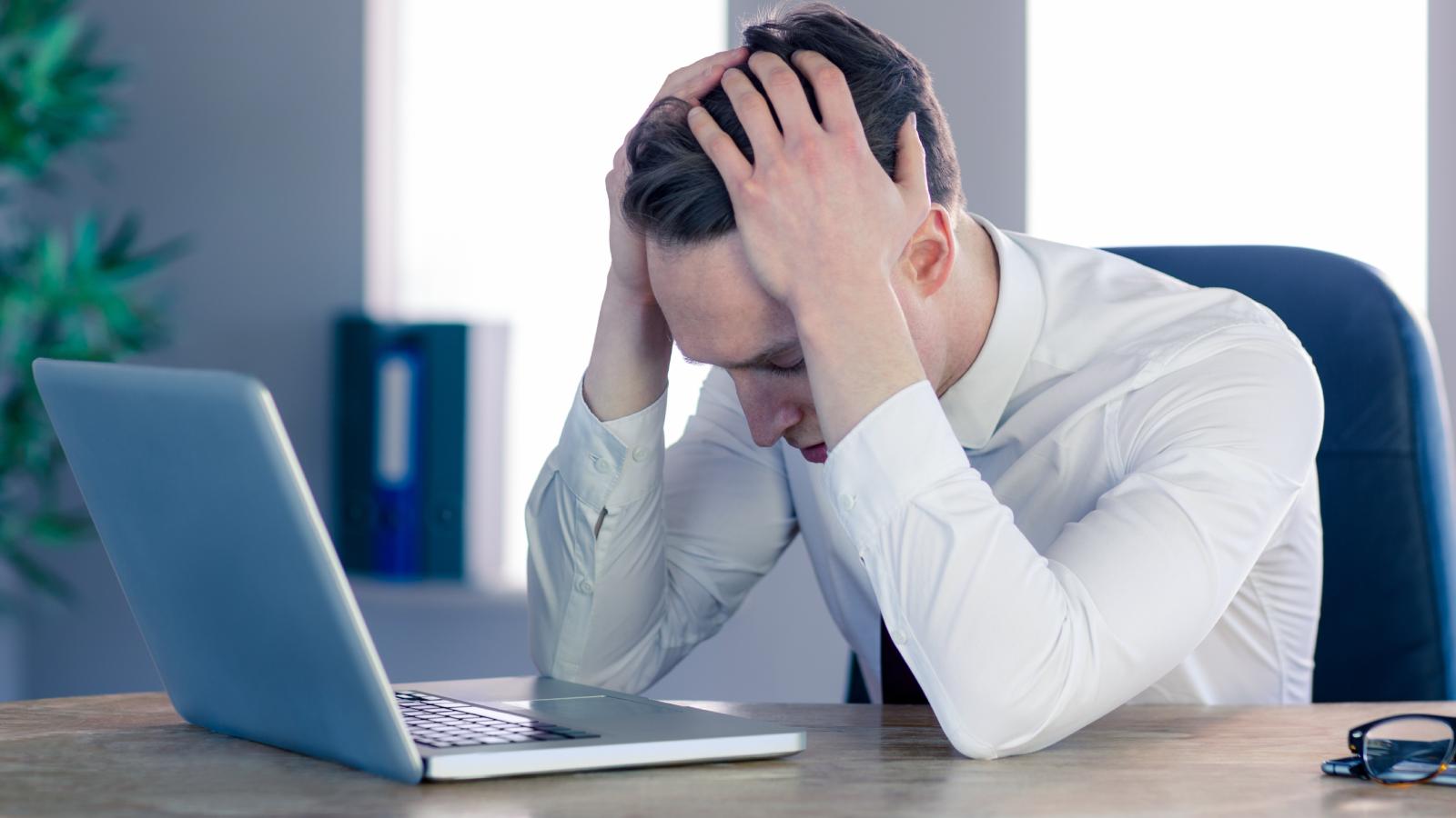 man at his desk