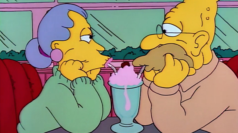 Grampa Simpson drinks a milkshake with Bea in 