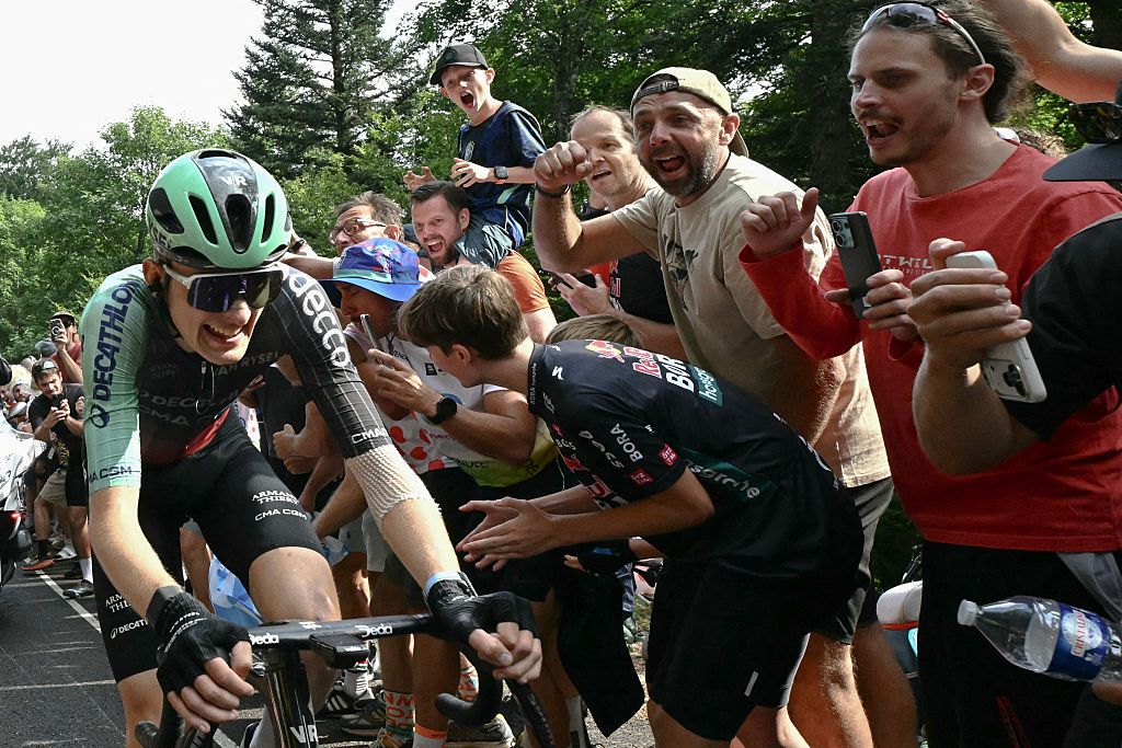 Paul Seixas chases down lead breakaway riders in the final kilometers of the final ascent during the 14th stage of the Tour de France