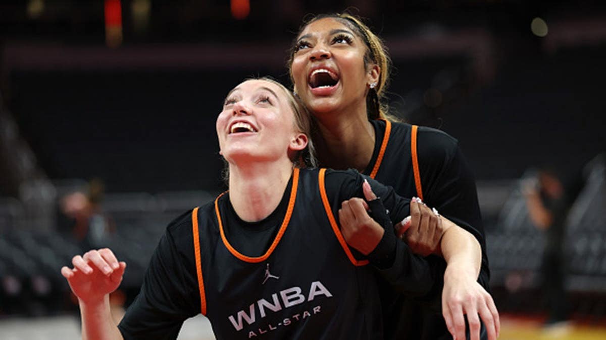 Paige Bueckers and Angel Reese react during WNBA All-Star practice at Gainbridge Fieldhouse.