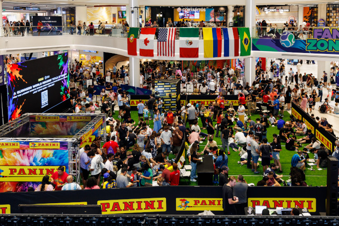 indoor crowd under flags