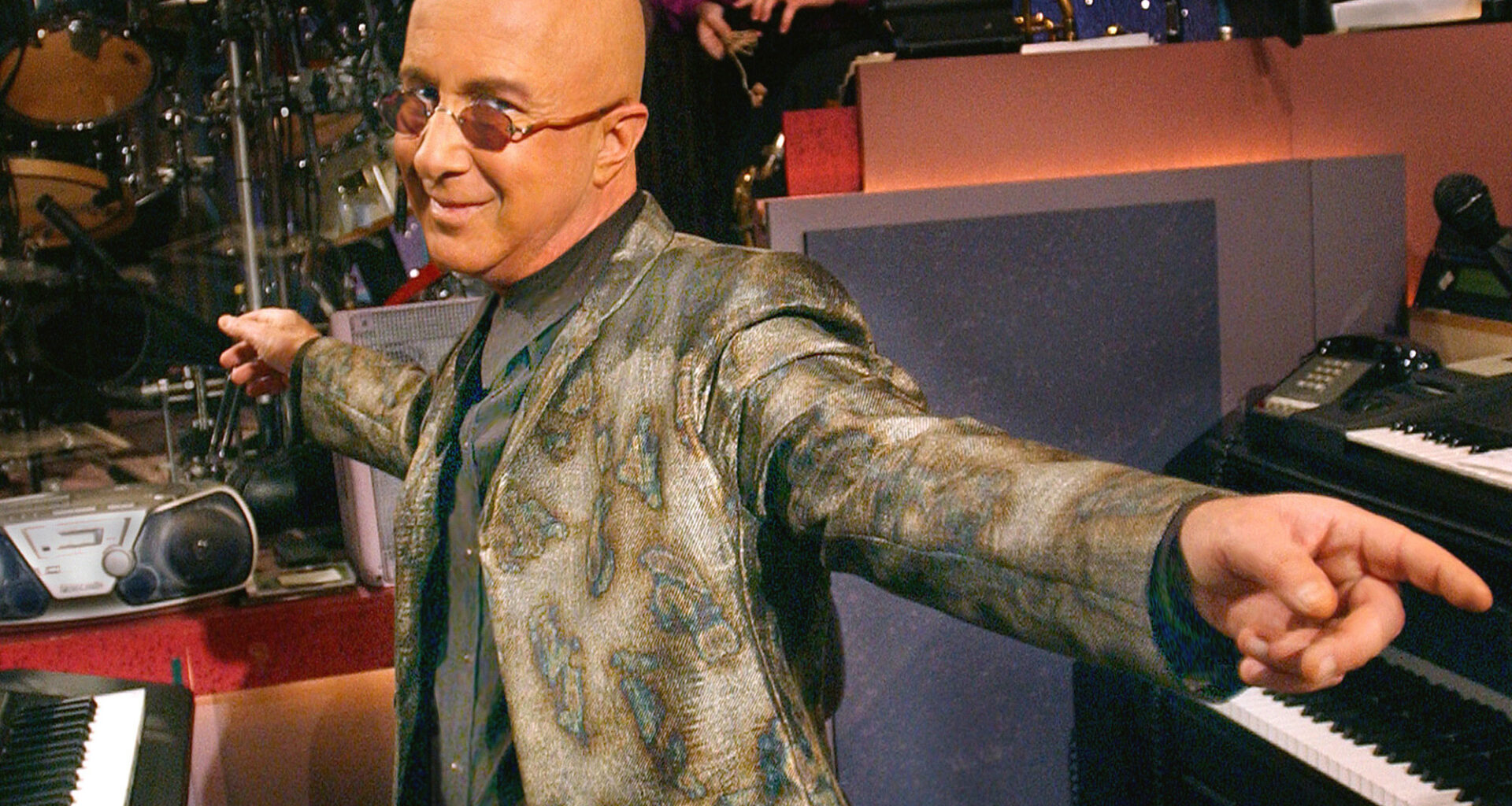 Paul Shaffer gestures at the keyboards on the set of the Late Show With David Letterman