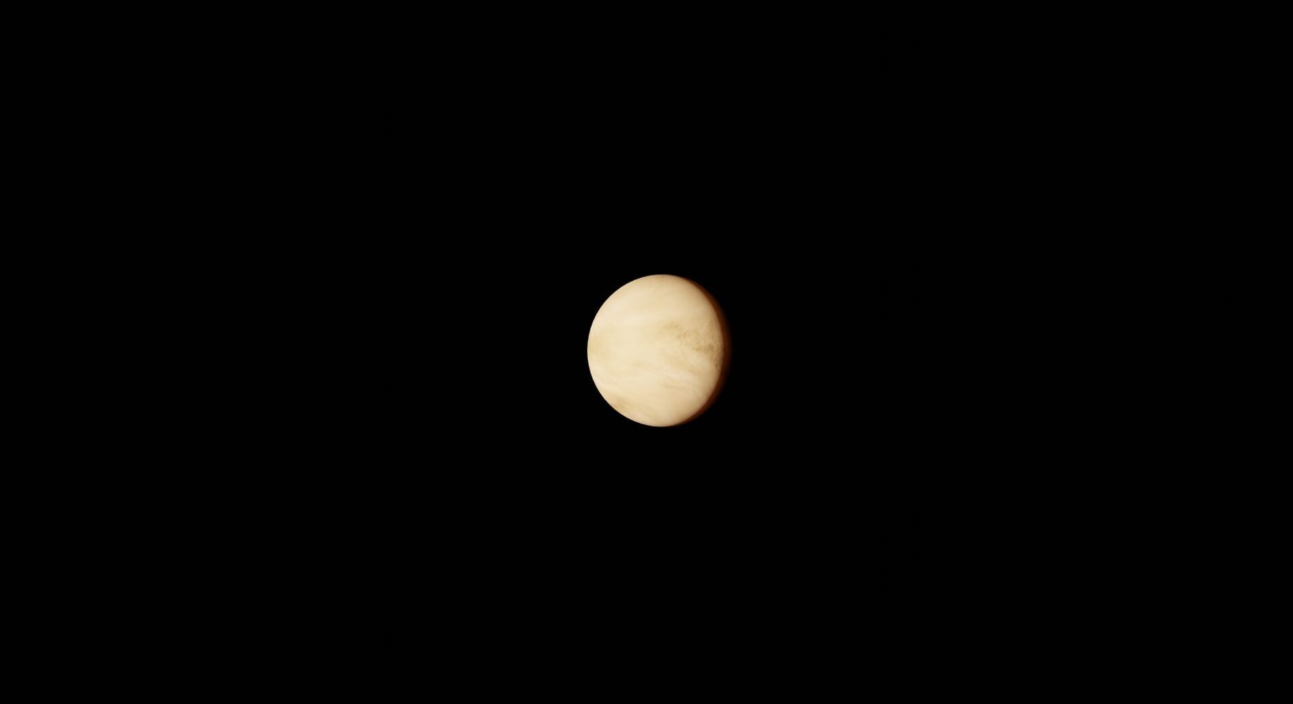 How does a planet spin so slowly that a single day there lasts longer than its entire year, while the clouds above it race all the way around in just four days?