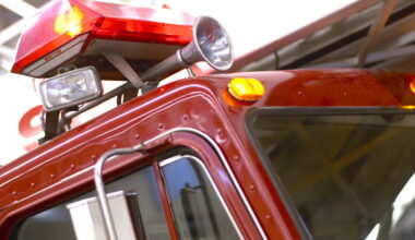 The top of a fire truck, showing a horn and lights