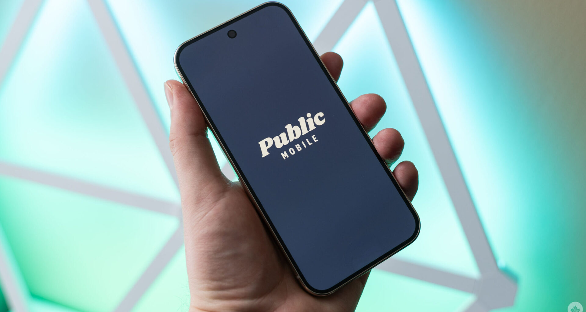 Public Mobile logo on a phone.