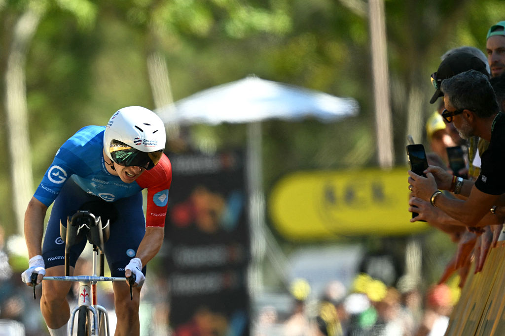 Groupama - FDJ United team's French rider Romain Gr&eacute;goire cycles to the finish line of the 1st stage of the 113th edition of the Tour de France cycling race, a 19,6 km team time trial stage in and around Barcelona in northeastern Spain, on July 4, 2026. (Photo by Loic VENANCE / AFP)
