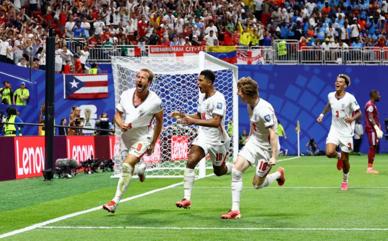 Soccer Football - FIFA World Cup 2026 - Round of 32 - England v DR Congo - Atlanta Stadium, Atlanta, Georgia, U.S. - July 1, 2026 England's Harry Kane celebrates scoring their first goal with Jude Bellingham and Anthony Gordon REUTERS/Bernadett Szabo
