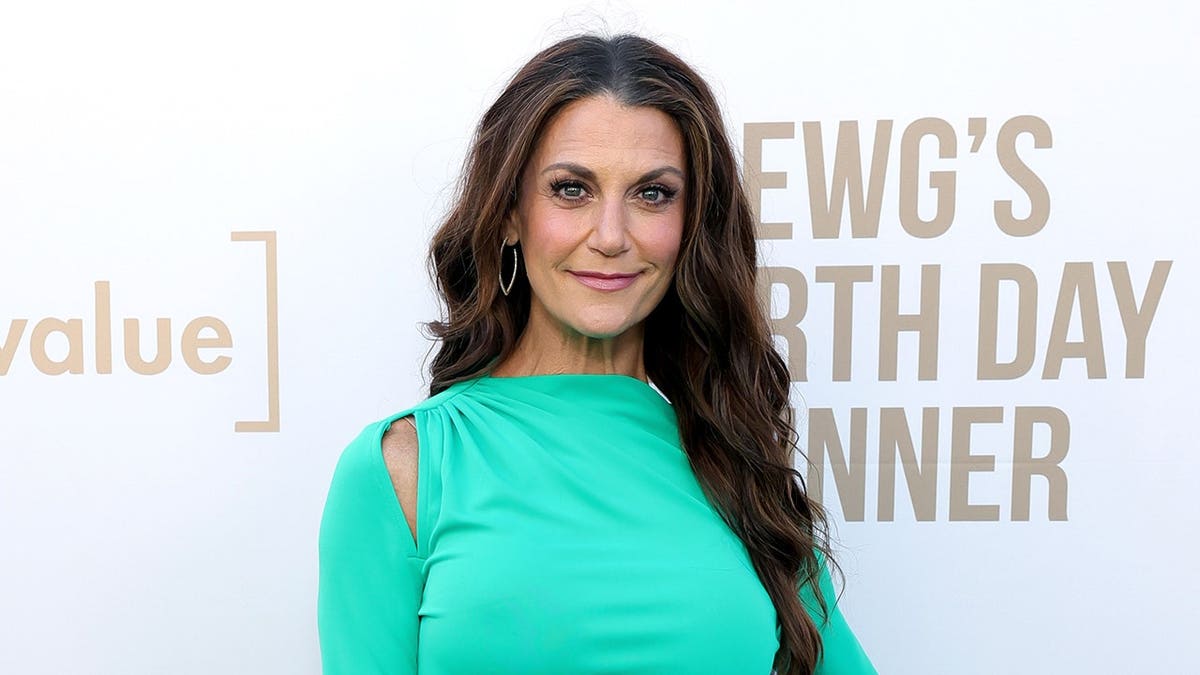 Samantha Harris standing at the Skirball Cultural Center in Los Angeles