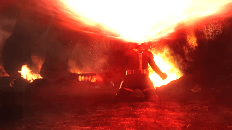 James Marsden as Cyclops shooting a laser into the sky with a Sentinel behind him