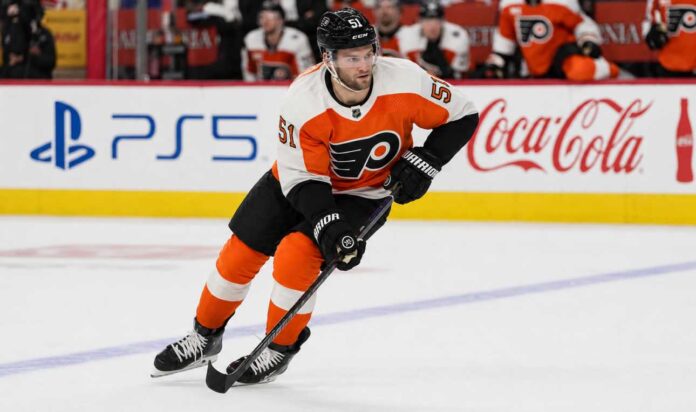 Shane Wright skates in a Philadelphia Flyers home jersey as Seattle Kraken trade rumors link the young center to Philadelphia.