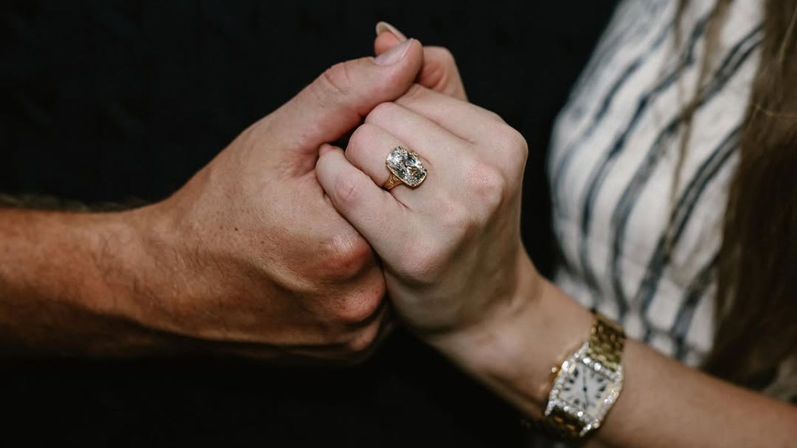 The couple shared a close-up of Swift’s engagement ring
