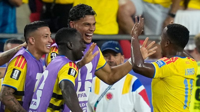 Colombia's Jhon Arias (11) celebrates after scoring his side's first goal during the World Cup round of 32 soccer match between Colombia and Ghana in Kansas City, Mo., Friday, July 3, 2026. (AP Photo/John Locher)
