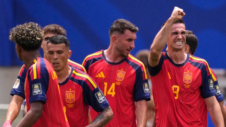 Spain's Fabian Ruiz (8) celebrates after scoring his side's opening goal