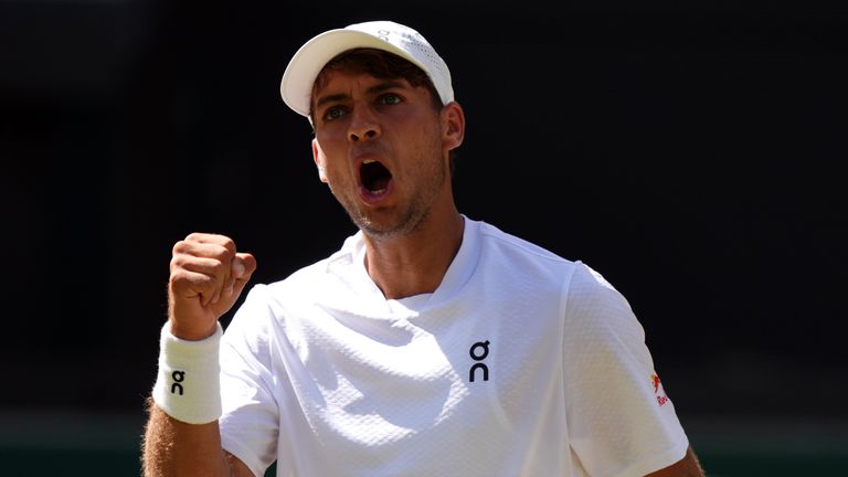 Flavio Cobolli of Italy celebrates during his Gentlemen's Singles match against Alex de Minaur of Australia on day eight of the 2026 Wimbled