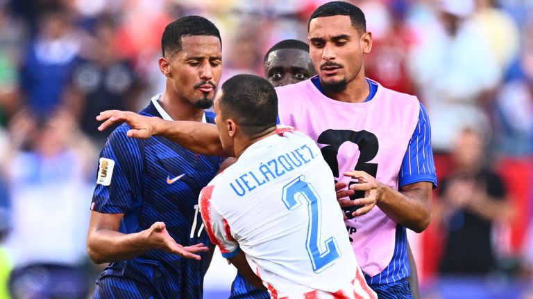 Gustavo Velazquez confronts William Saliba and Maxcence Lacroix