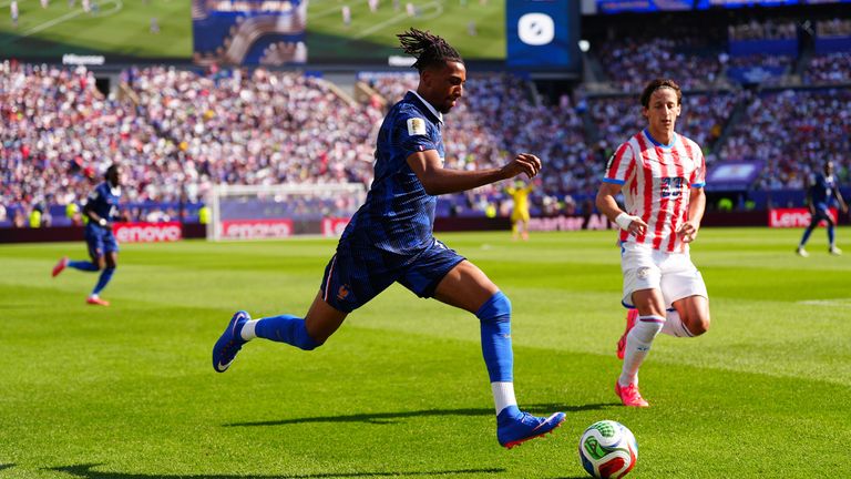 France's Michael Olise runs with the ball against Paraguay