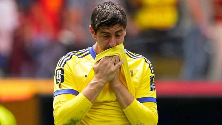 Thibaut Courtois was forced off in tears in the second half, replaced by Senne Lammens of Man Utd